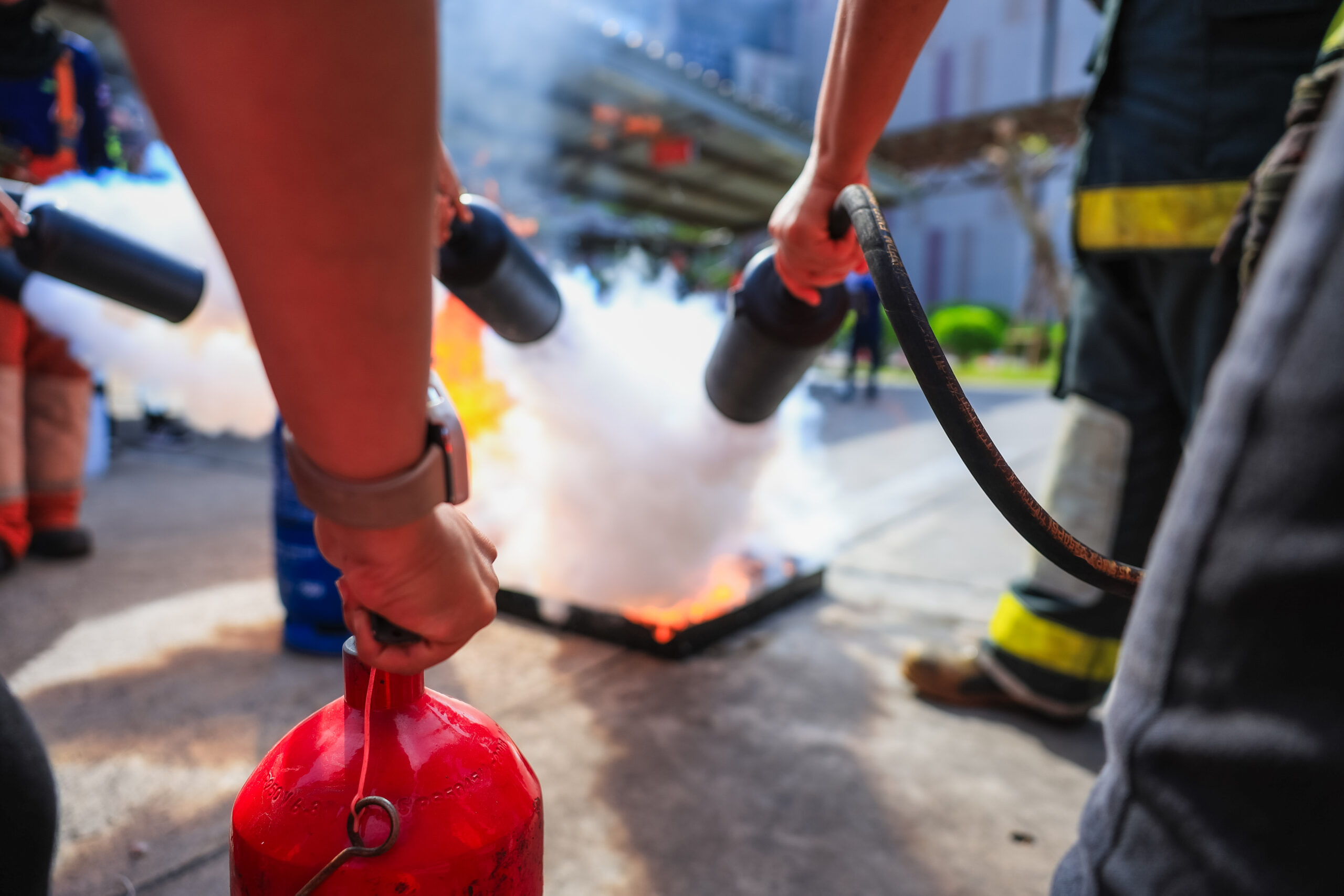Company employees are undergoing basic fire extinguishing training, fire extinguisher use, safety week, fire prevention, loss prevention,